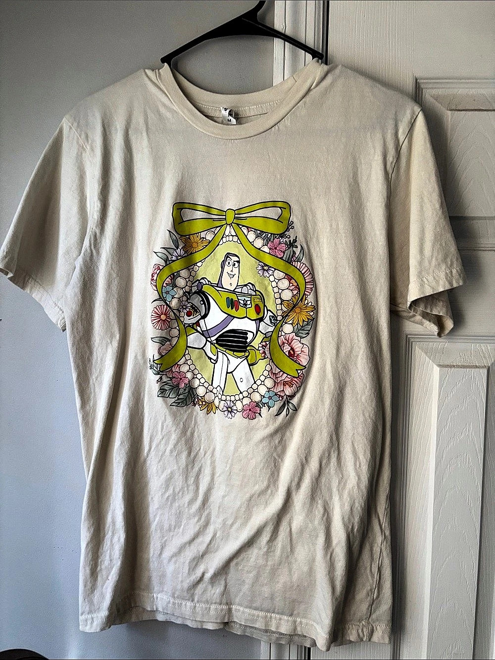 Outlast Buzz Lightyear graphic tee Graphic Tee in Cream Size Medium